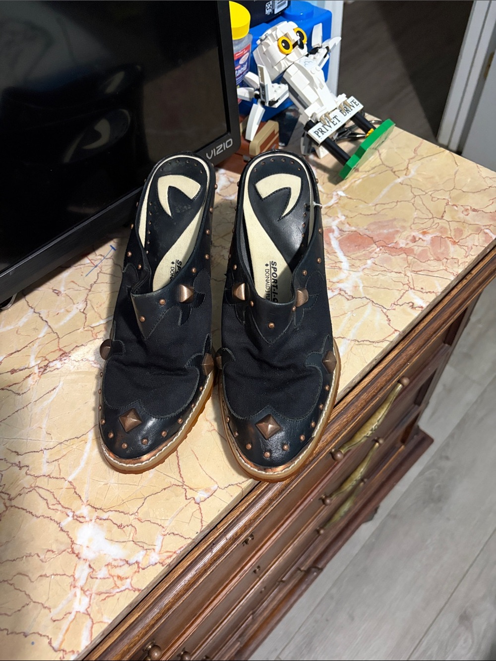 Donald J. Pliner Black Slip-On Clog with Bronze Stud Accents